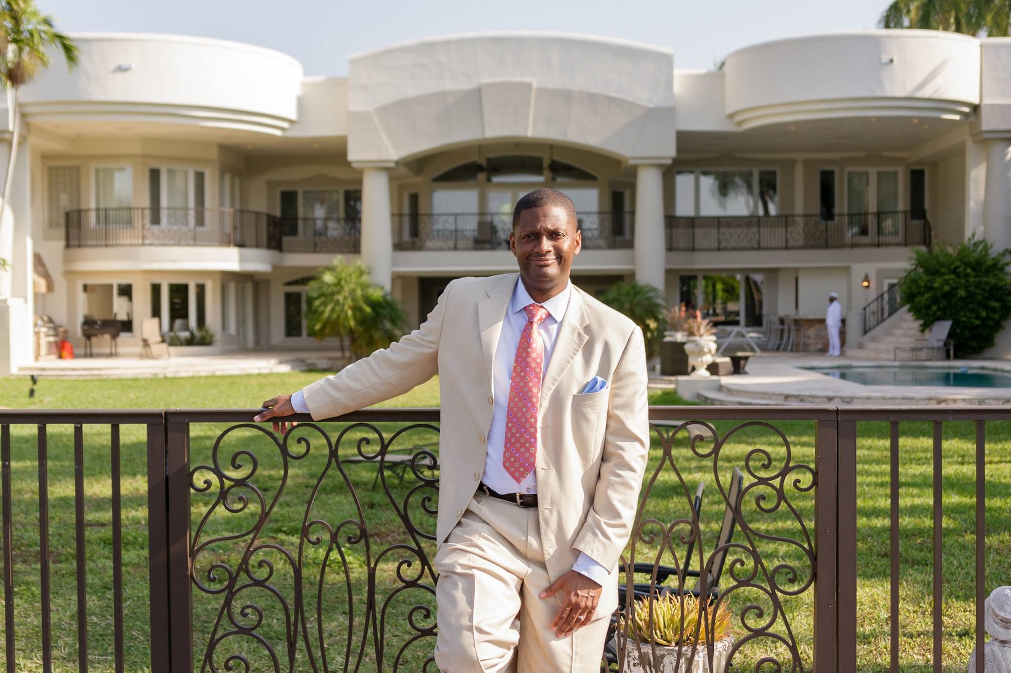 Jacque T. Morris in a light suit